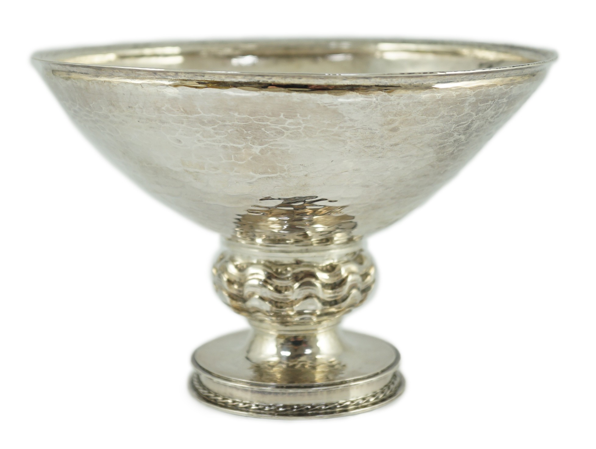 A George V Omar Ramsden planished silver pedestal bowl